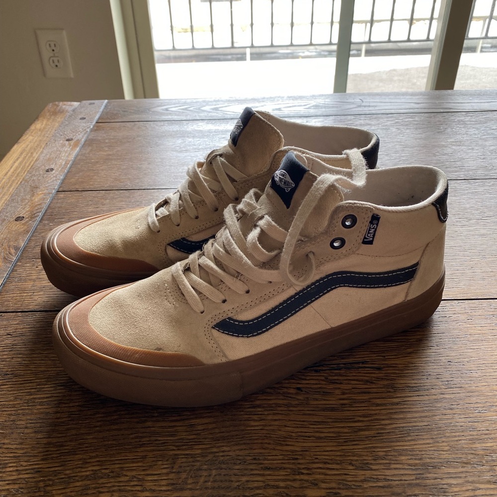 Tan high top vans